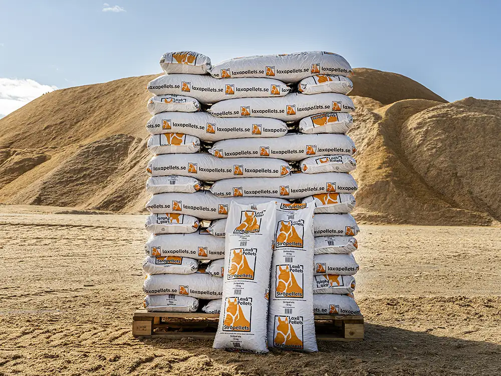 Pallet of Laxå Bedding Pellets standing in the yard of their factory in Sweden
